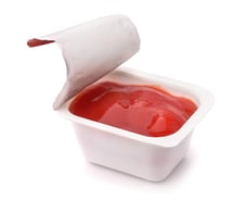single-serve-condiment-packaging-ketchup-sealed